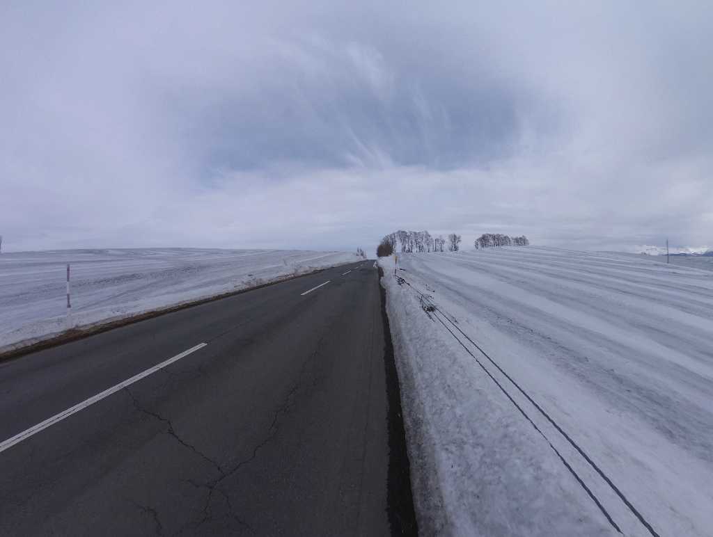 Road to Biei with wide snowfield