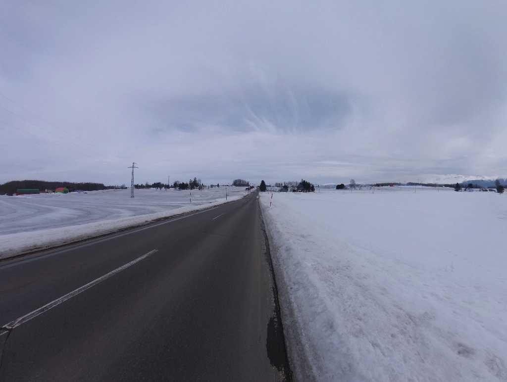 Road to Biei with wide snowfield